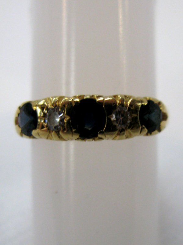 18ct Gold Sapphire and Two Diamond Ring