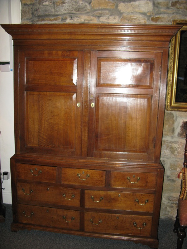 Circa 1750 light oak cupboard on chest