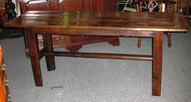 Oak table of two plank construction with cleated ends